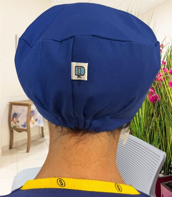 Eco Ninjas Elastic Back Theatre Badge Hat in Royal Blue — rear view